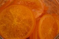 Taronja rodanxes confitada